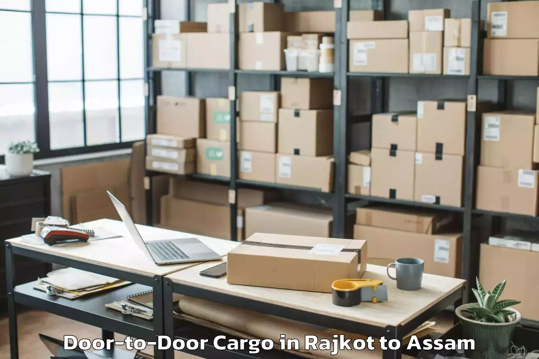 Reliable Rajkot to Marigaon Door To Door Cargo